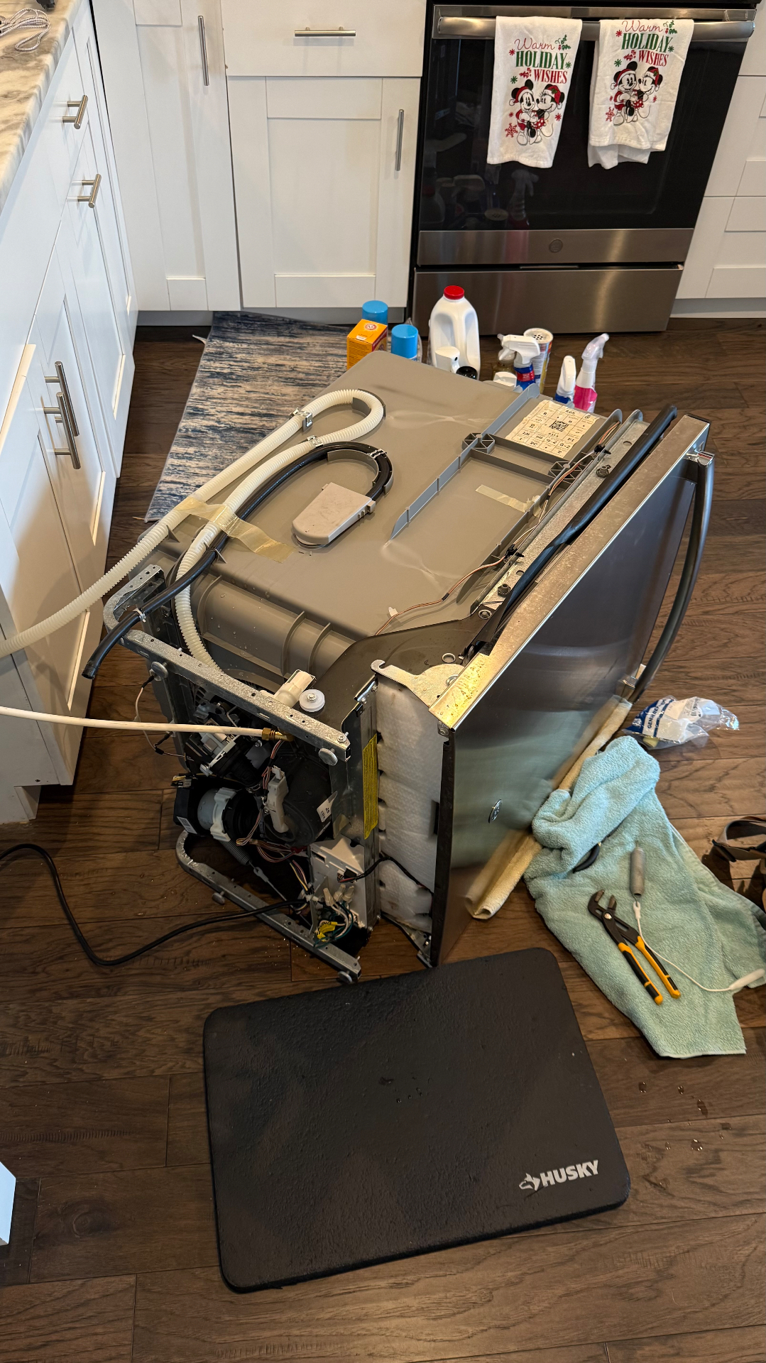 Dishwasher pulled out for repair service